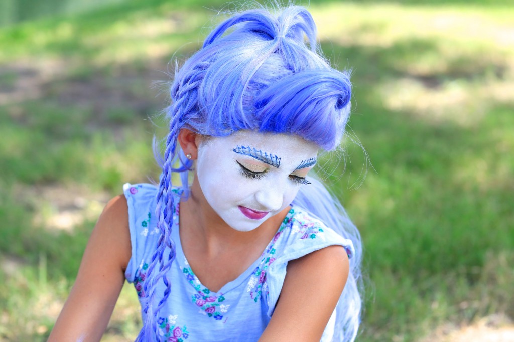 Young girl dressed up as Monster High's Sirena Von Boo | Halloween Hairstyles