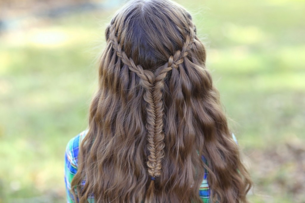 Young girl outside modeling Scissor Waterfall Braid Combo