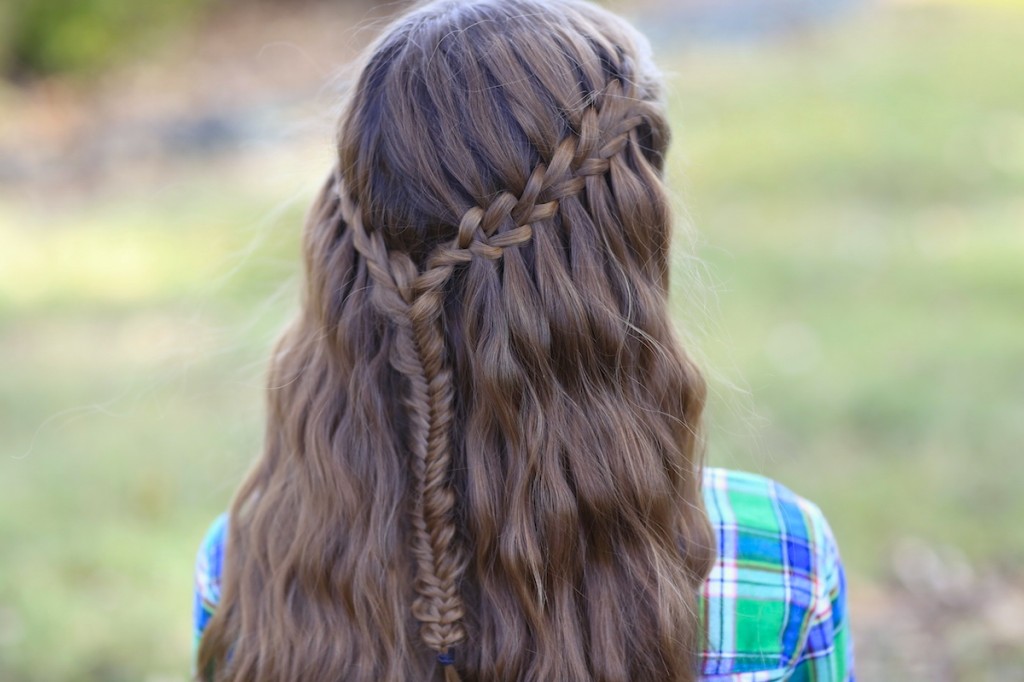 Young girl outside modeling Scissor Waterfall Braid Combo