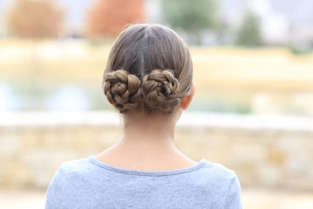 Young girl outside modeling Prim's Braided Updo | Hunger Games Hairstyles