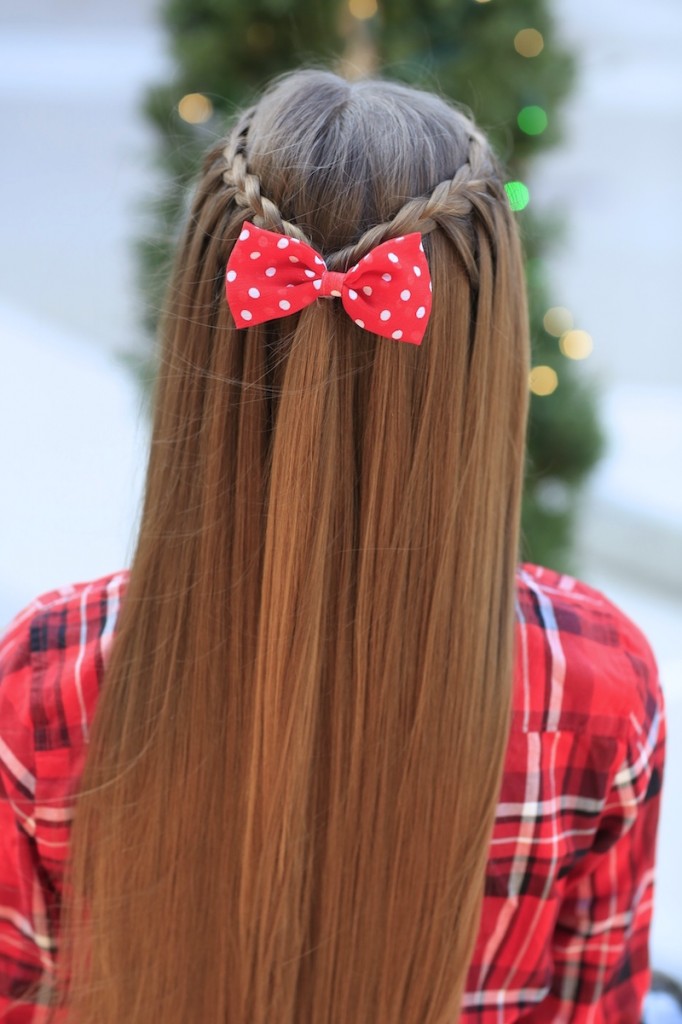 Young girl outside modeling Upward Lace Braid (back)