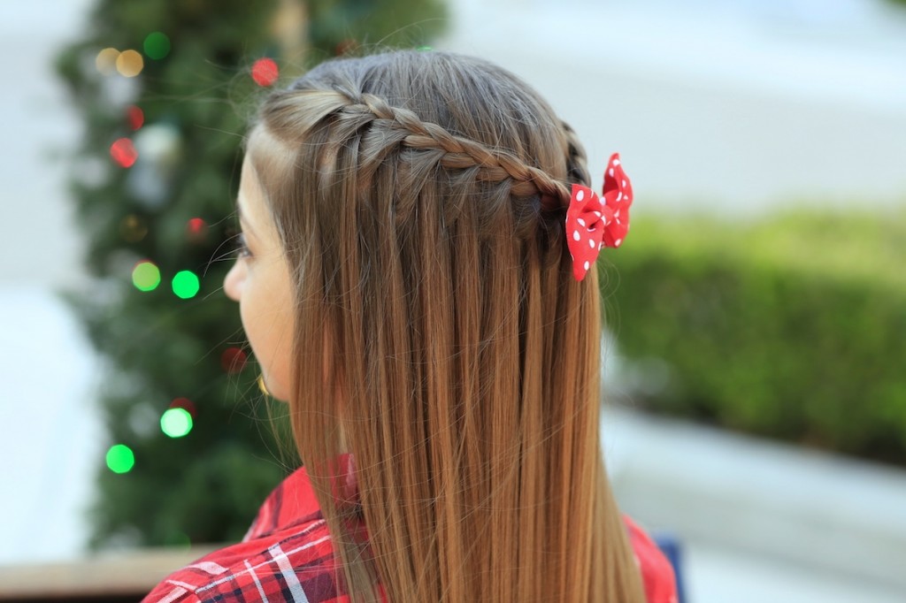 Young girl outside modeling Upward Lace Braid