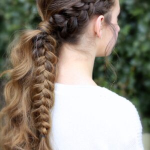 Young girl outside wearing a white shirt modeling Viking Braid Ponytail | Ponytail Ideas