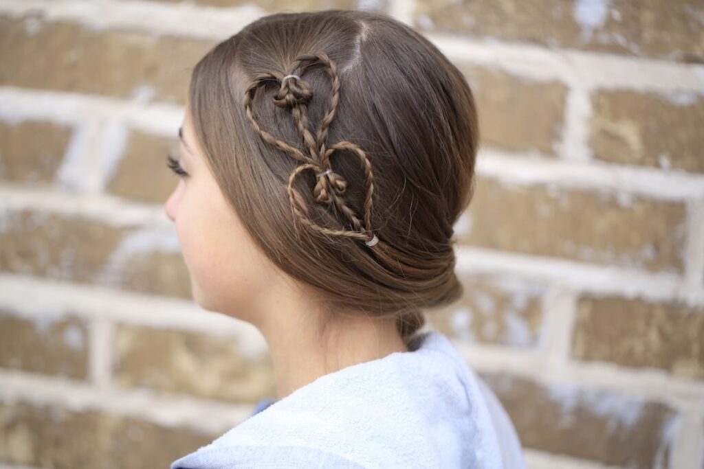 Little girl outside modeling Cute Heart Accents | Valentine's Day Hairstyles