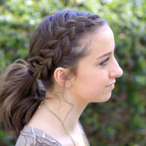 Portrait of young girl outside modeling Dutch Accent Ponytail | Short Hairstyles