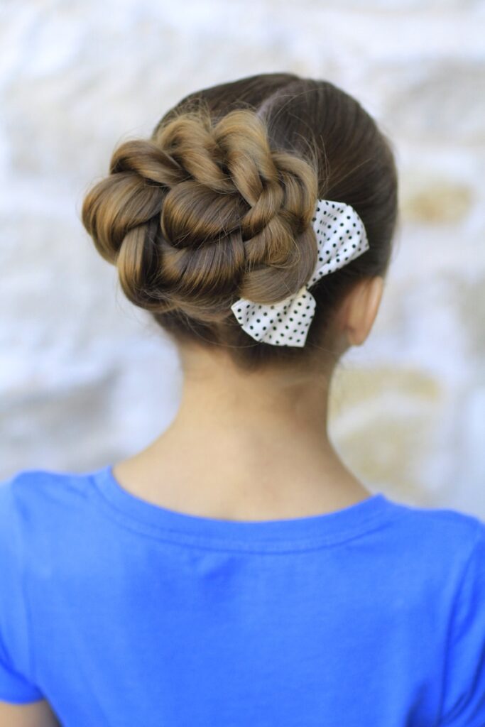 Young girl outside modeling Rope Twisted Bun | Hairstyles for Prom