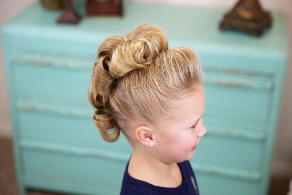 Little girl indoors Flower Bun Hawk | Hairstyles for Dance