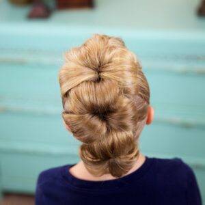 Little girl indoors Flower Bun Hawk | Hairstyles for Dance (Back)