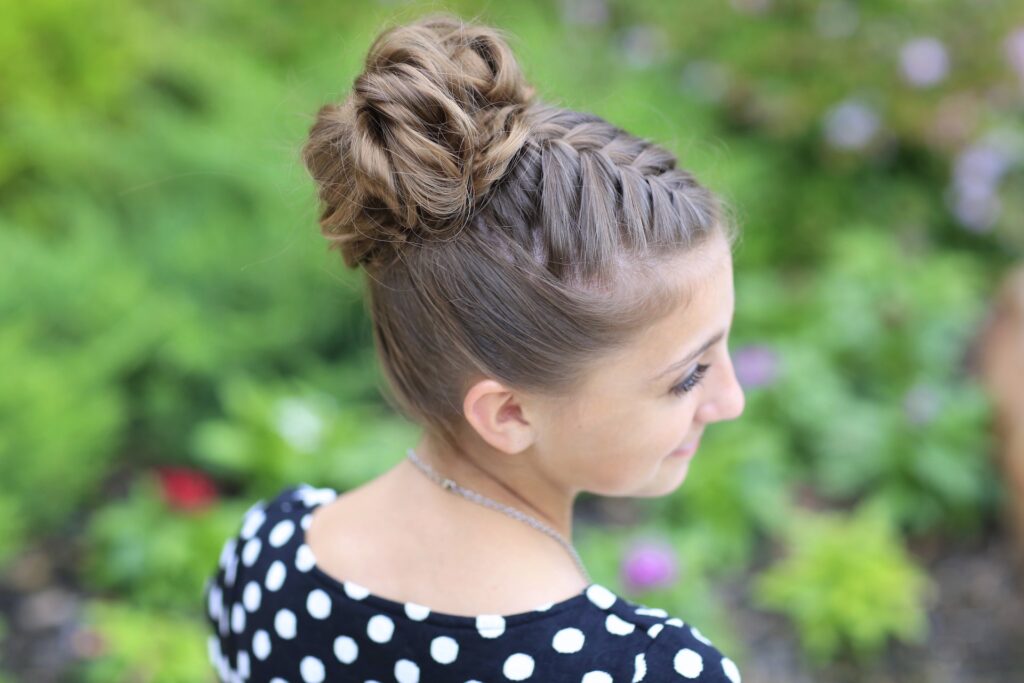 Young girl outside modeling Double-French Messy Bun Updo