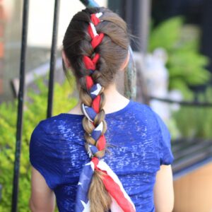 Young girl outside modeling 3-Minute Scarf Braid | 4th of July Hairstyles (Back)