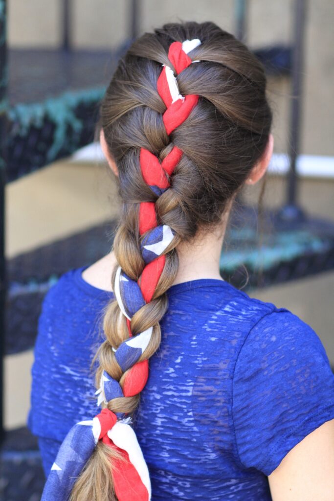 Young girl outside modeling 3-Minute Scarf Braid | 4th of July Hairstyles