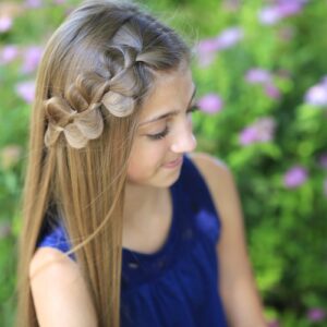 Young girl outside modeling Rick Rack Braid