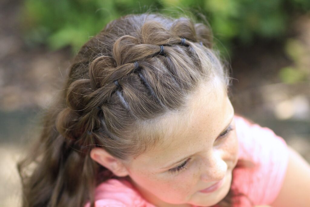 Young girl outside modeling The Split Headband | Hairstyles for Short Hair