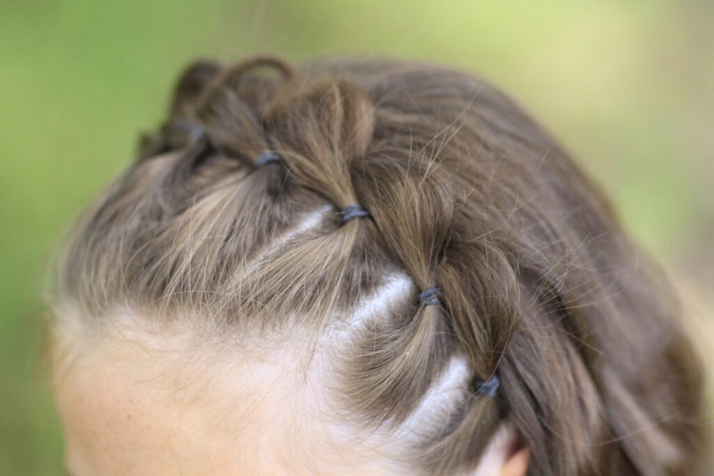 Young girl outside modeling The Split Headband | Hairstyles for Short Hair