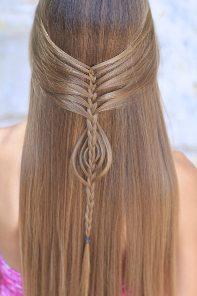 Young girl outside modeling Mermaid Braid Combo