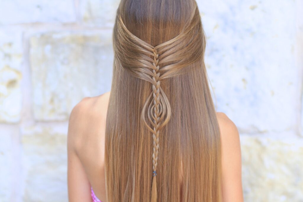 Young girl outside modeling Mermaid Braid Combo