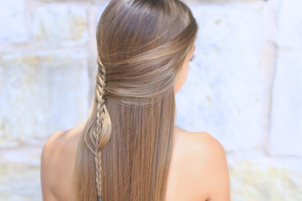 Young girl outside modeling Mermaid Braid Combo