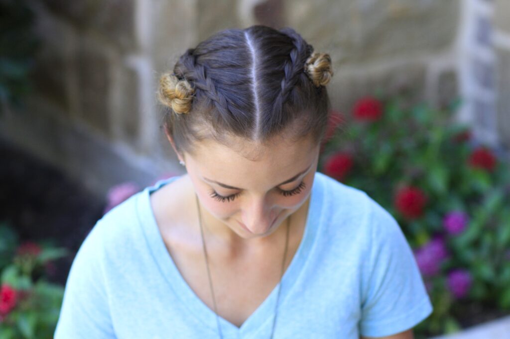 Young girl outside modeling Fold Up Braids | Back-to-School Hairstyles (front)