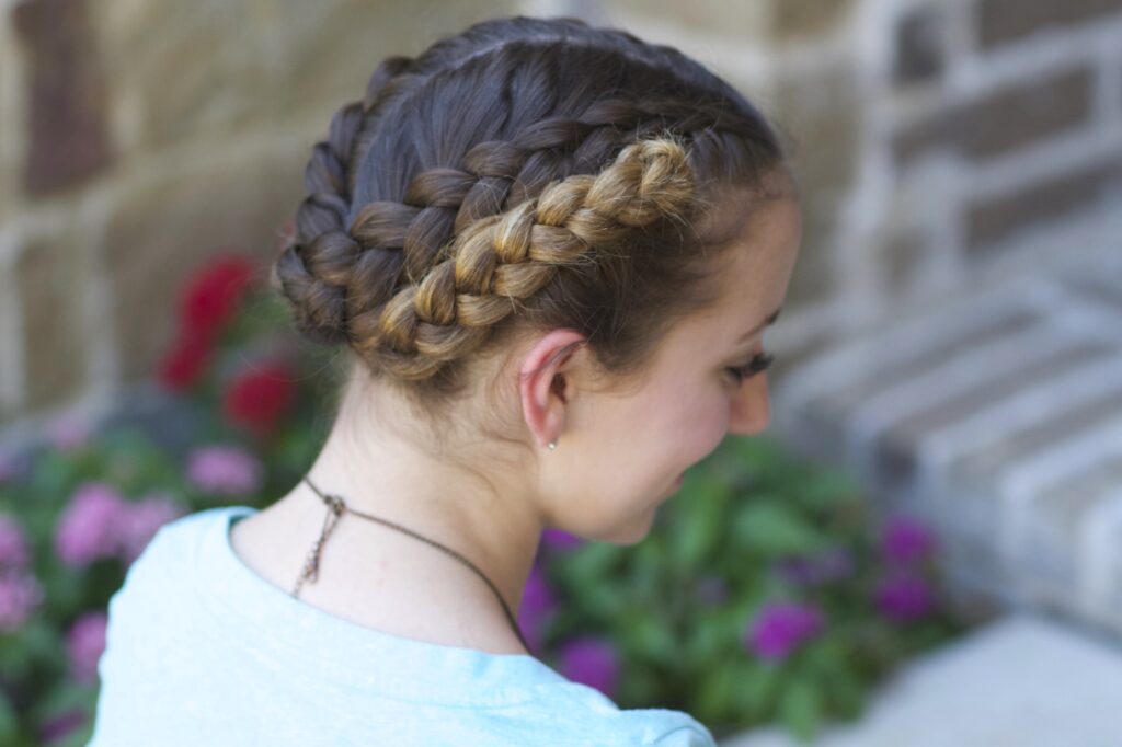 Young girl outside modeling Fold Up Braids | Back-to-School Hairstyles