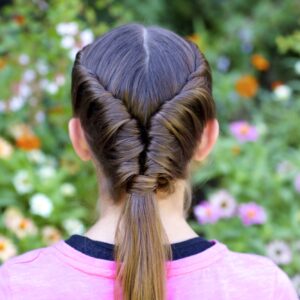 Young girls outside modeling Tornado Twist hairstyle (back)