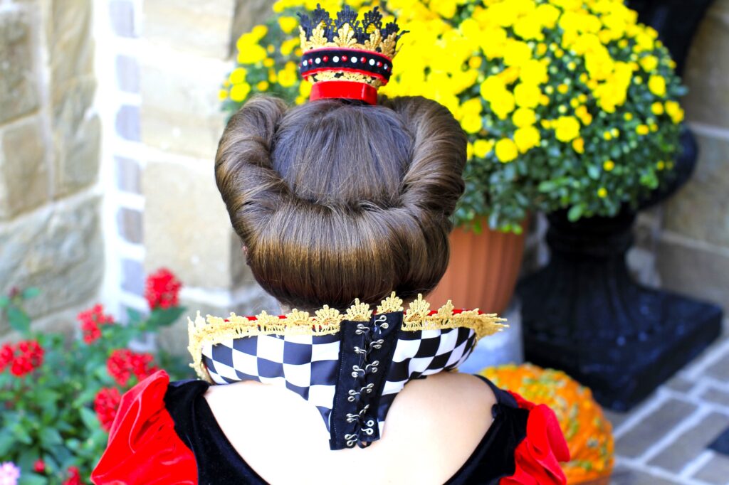 Young girl dressed up as the Queen of Hearts | Halloween Hairstyle (Back)