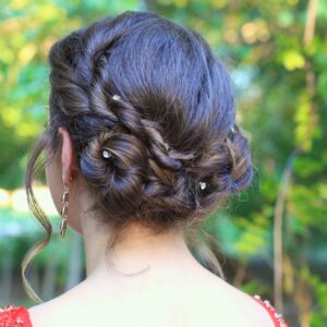 Young girl outside modeling Rope Twist Updo | Homecoming Hairstyles