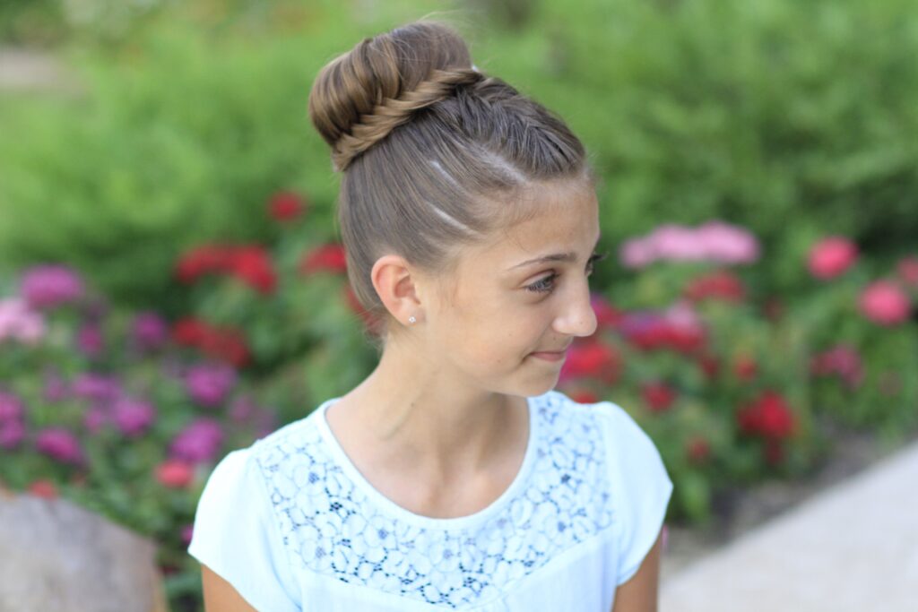 young girl outside modeling Lace Fishtail Bun