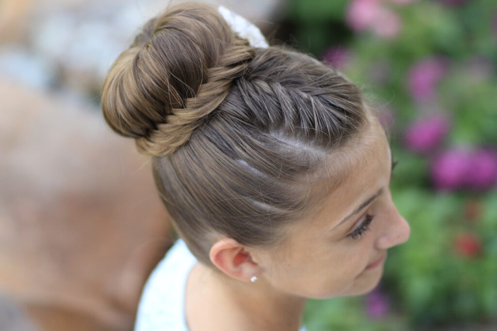 young girl outside modeling Lace Fishtail Bun