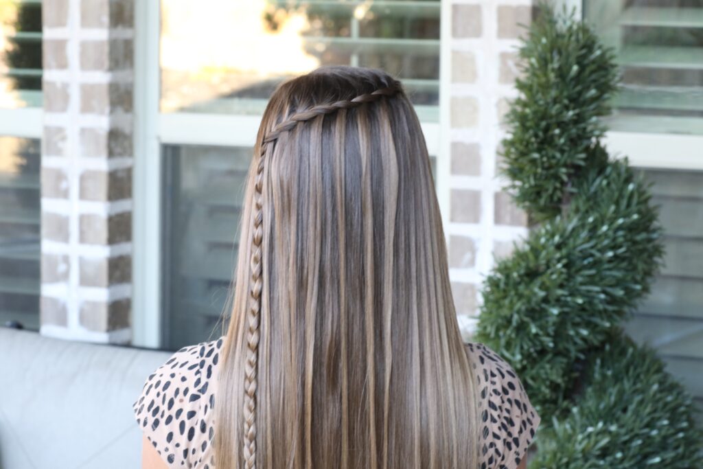 Young girl outside modeling Lattice Braid Combo