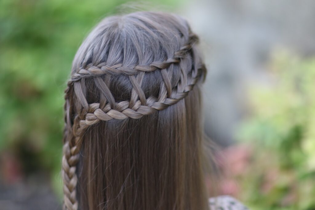 Young girl outside modeling Lattice Braid Combo