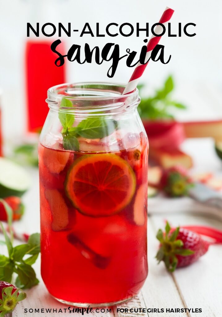 Sangria on a wooden table surrounded by strawberries | CGH Lifestyle