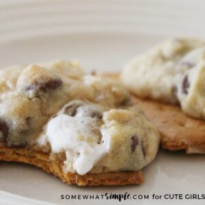 Campout Cookies laying on a white plate with one cookie bit