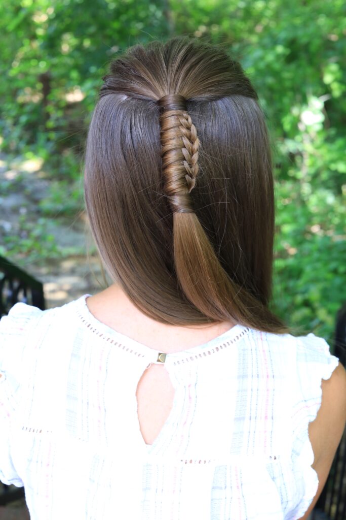 Back view of girl with long hair modeling "Reverse Chinese Ladder" hairstyle