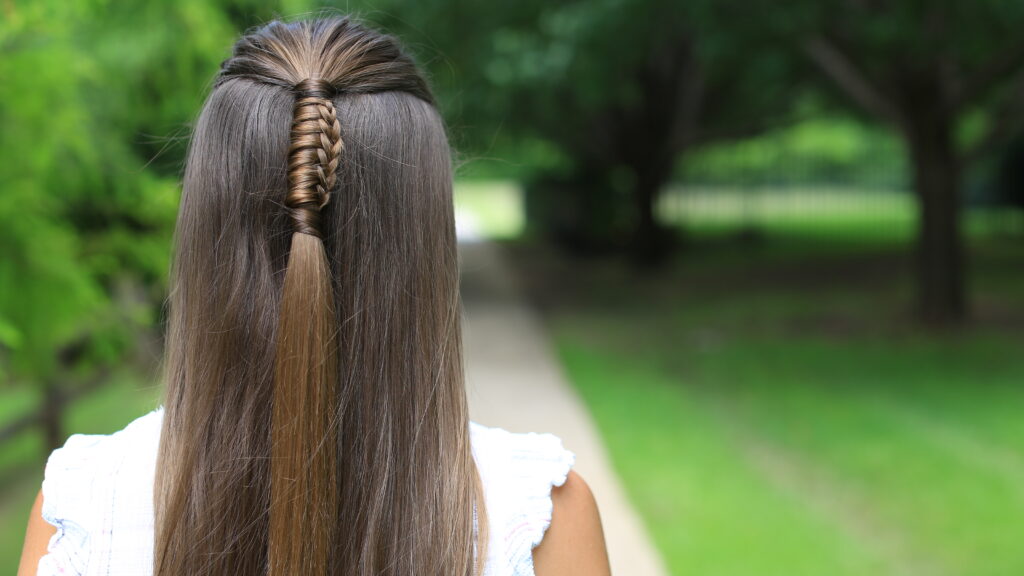 Back view of girl with long hair modeling "Reverse Chinese Ladder" hairstyle