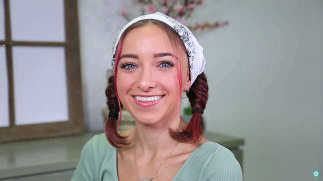 Young girl modeling hairstyle with bandana